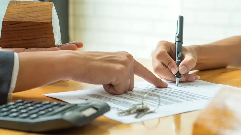 Landlord signing a tenancy agreement with a gas safety certificate Wolverhampton