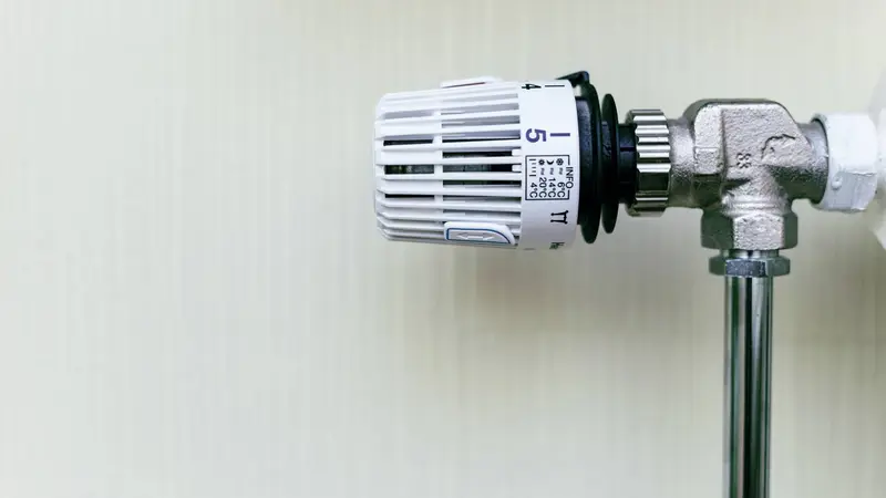 Close up of a radiator thermostatic valve before a power flush Wolverhampton